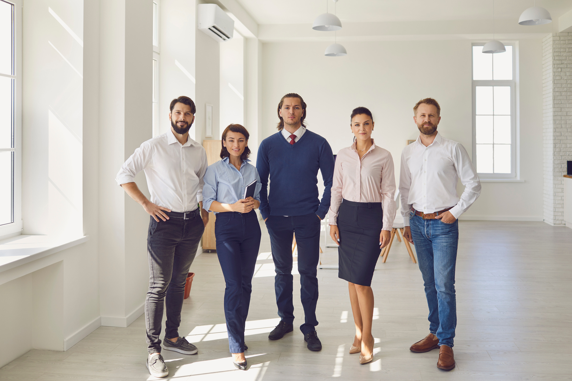 Portrait of Business Coaches with Office Workers Looking at Camera in Business Center Office.